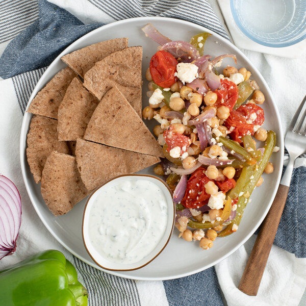 Mediterranean Veggie Chickpea Bake with Feta, Tzatziki & Pita