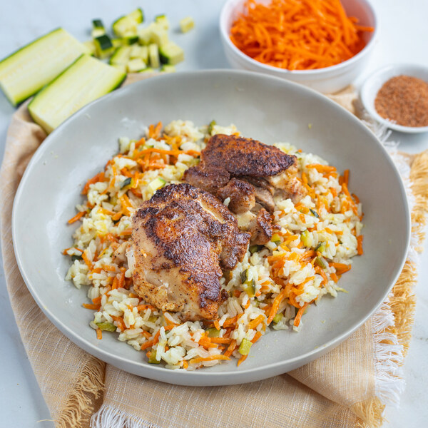 Pan-Fried Cajun Chicken Thighs with Zucchini & Carrot Rice Pilaf