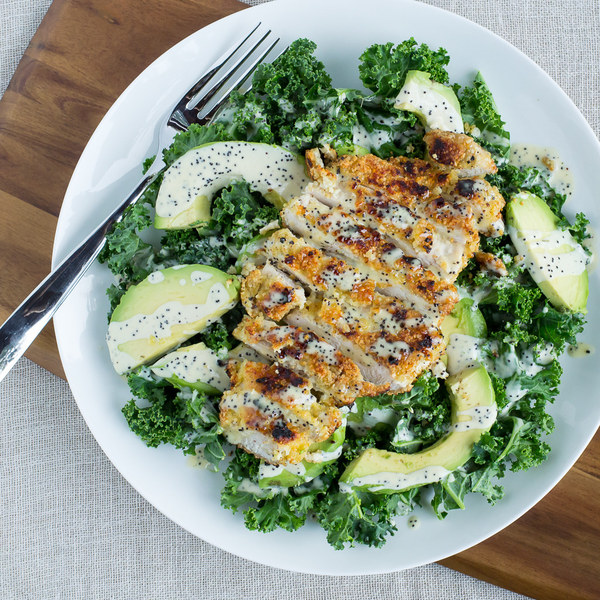 Almond Crusted Chicken & Kale Salad with Avocado & Poppyseed Dressing