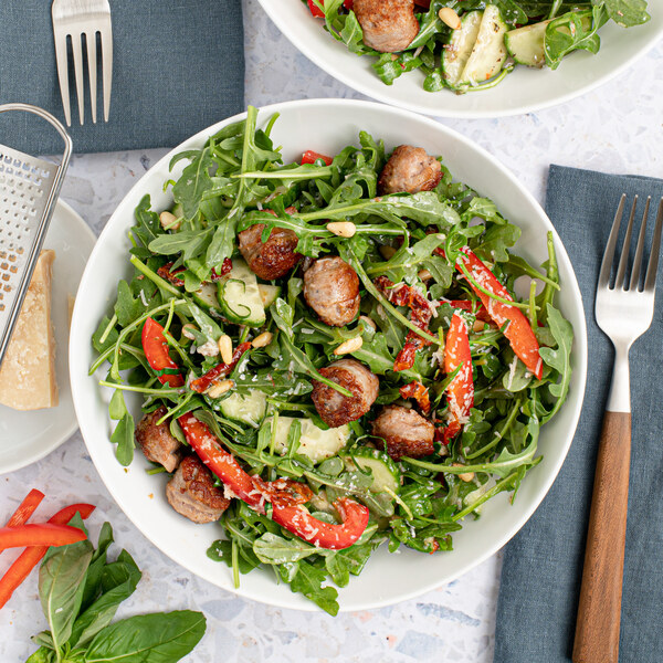 Arugula Salad with Sausage, Bell Pepper, Parmesan, Pine Nuts & Basil