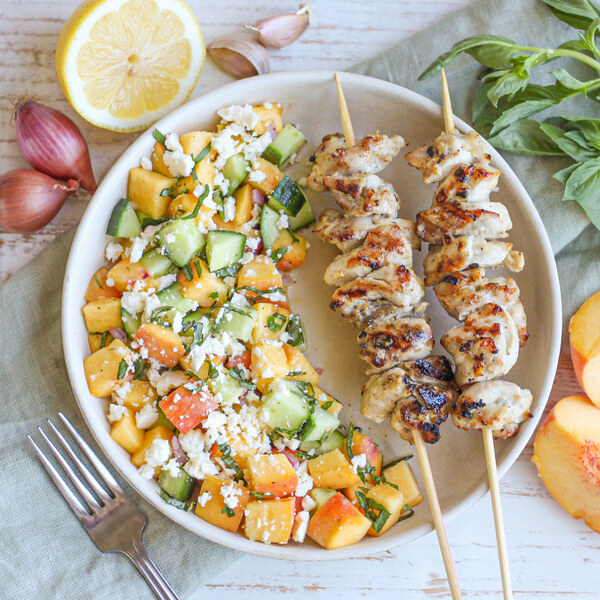 Lemon-Garlic Chicken Skewers with Cucumber, Peach, Basil & Feta Salad
