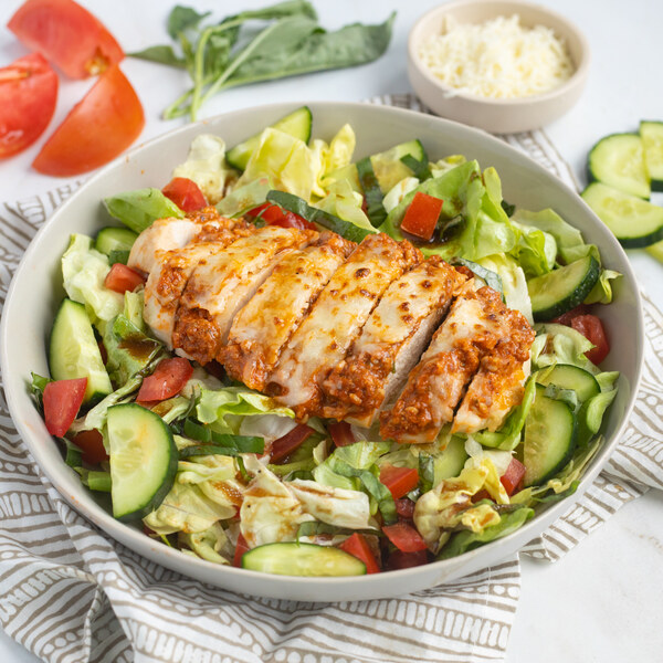 Cheesy Broiled Chicken with Sun-Dried Tomato Pesto over Italian Salad