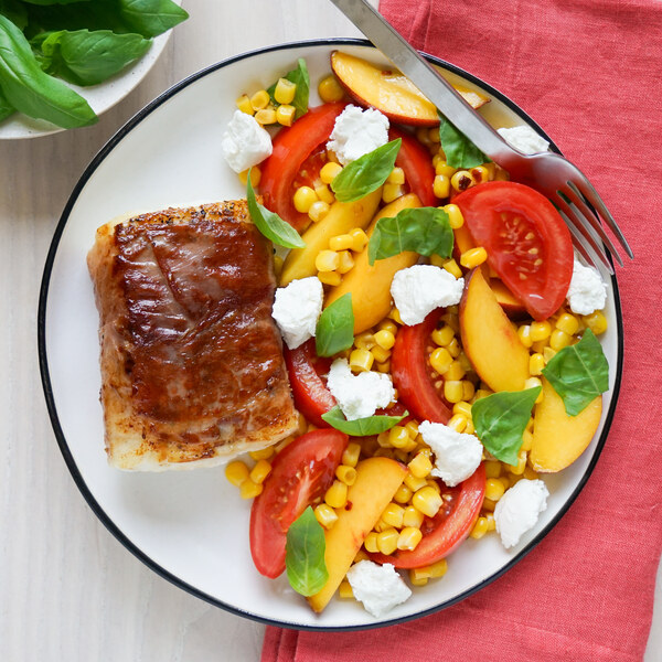 Prosciutto-Wrapped Cod with Tomato, Corn, Peach & Goat Cheese Salad