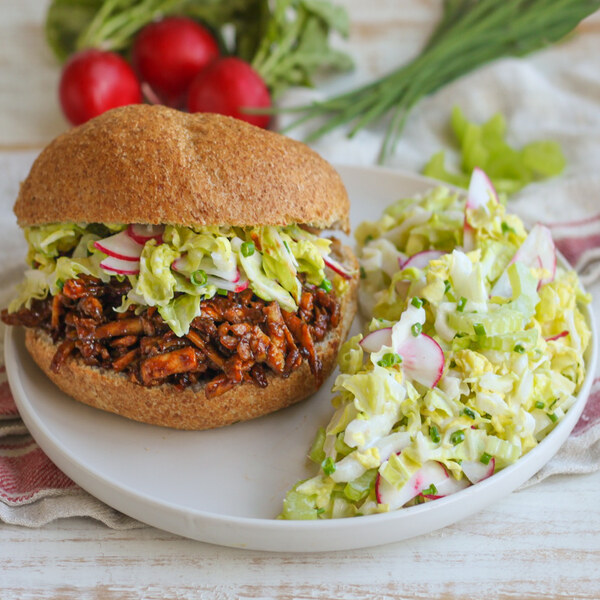 Shredded BBQ Tofu Bun with Creamy Cabbage, Radish, Celery & Chive Slaw