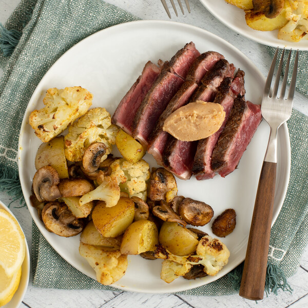 Seared Strip Steak with Lemon-Miso Butter & Curry Roasted Vegetables