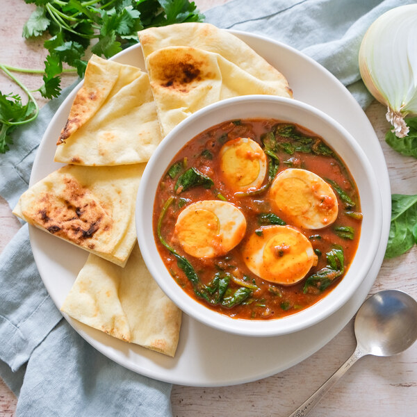 Indian Egg, Tomato & Spinach Curry with Toasted Naan Bread