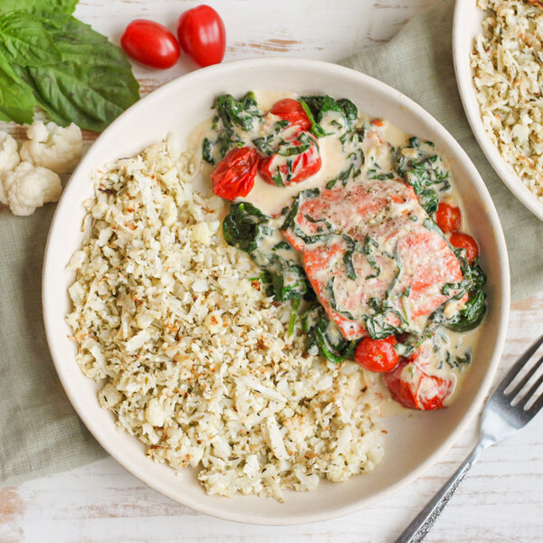 Salmon with Cauliflower Rice, Spinach, Tomatoes & Creamy Basil Sauce
