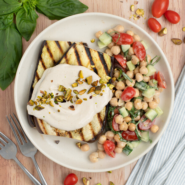 Grilled Eggplant with Garlic-Tahini Sauce, Pistachios & Chickpea Salad