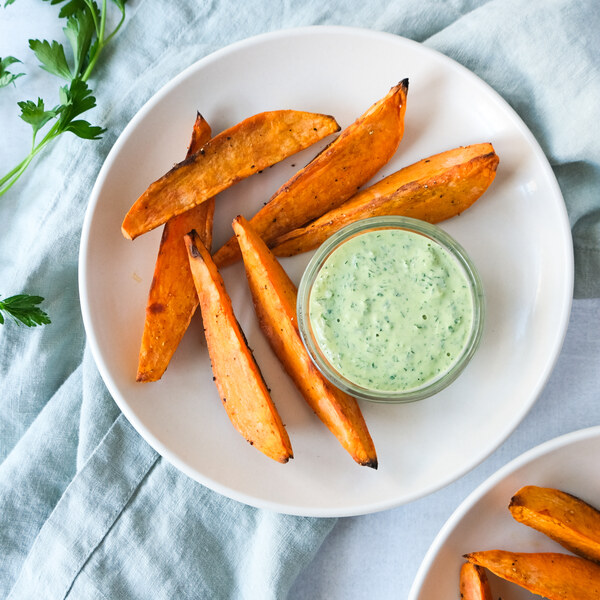 Roasted Sweet Potato Wedges with Garlicky Parsley-Tahini Sauce