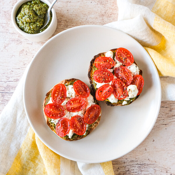 English Muffin Pizzas with Basil Pesto, Goat Cheese & Tomatoes