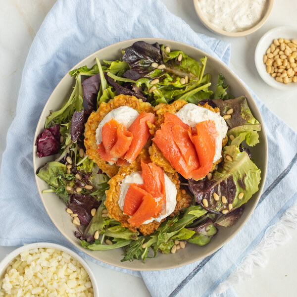 Cauliflower Fritters with Tzatziki, Smoked Salmon, Greens & Pine Nuts