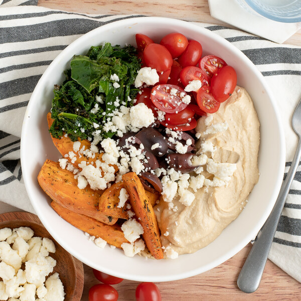 Roast Sweet Potato Bowl with Crispy Kale, Hummus, Olives & Feta
