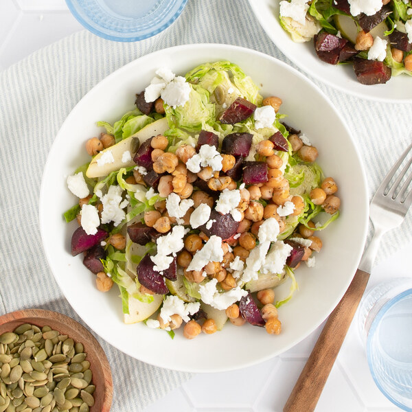 Brussels Sprout Salad with Warm Chickpeas, Beet, Pear & Goat Cheese