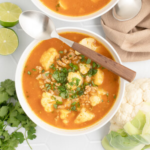 Chili-Spiced Pumpkin Soup with Pork, Cauliflower, Cilantro & Lime