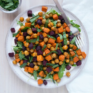Warm Beet-Sweet Potato Salad with Chickpeas, Arugula & Tahini Yogurt