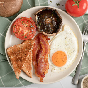 British-Style Breakfast with Bacon, Fried Egg, Portobello & Tomato