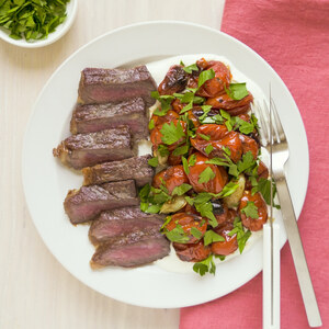 Steak with Blistered Tomatoes, Roasted Garlic, Lemony Yogurt & Parsley